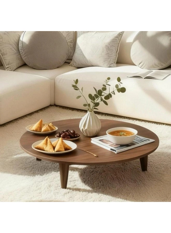 A round floor table with a stylish, modern design. - Image 2